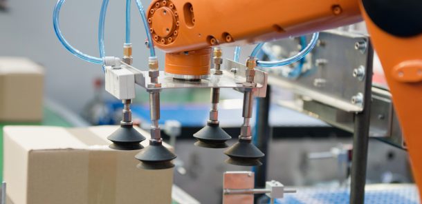Robotic arm working on a production line